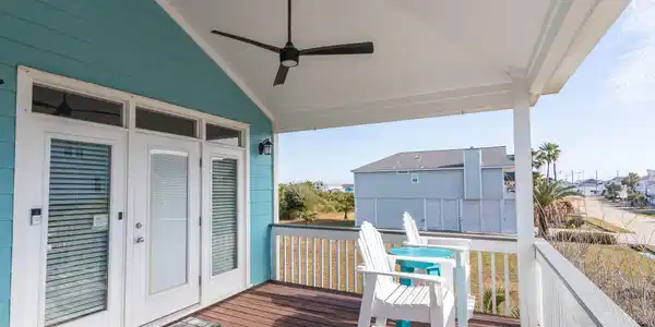 Image 4: Additional seating.  French doors open to a large