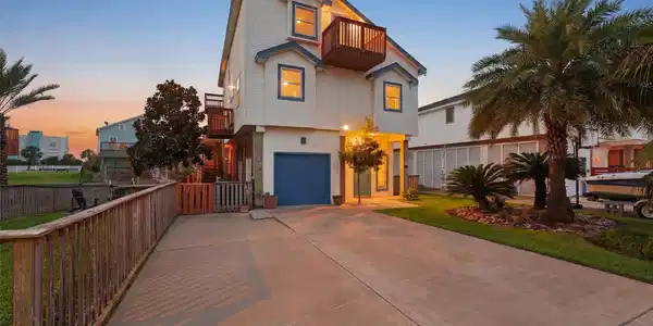 Image 2: Welcome home to Tiki Island, where relaxed coastal