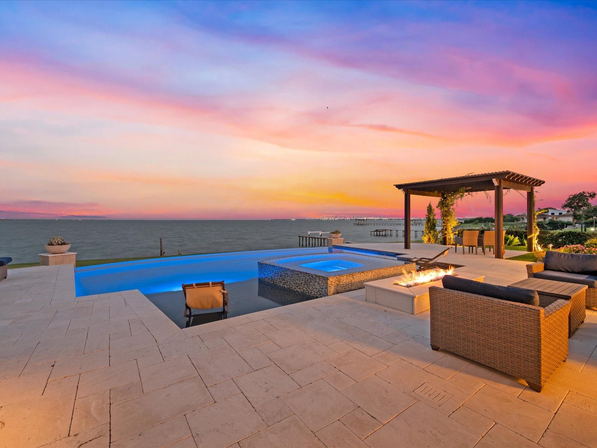 Image 2: THE POOL BOASTS 2 TANNING LEDGES AND EXTENSIVE ARE