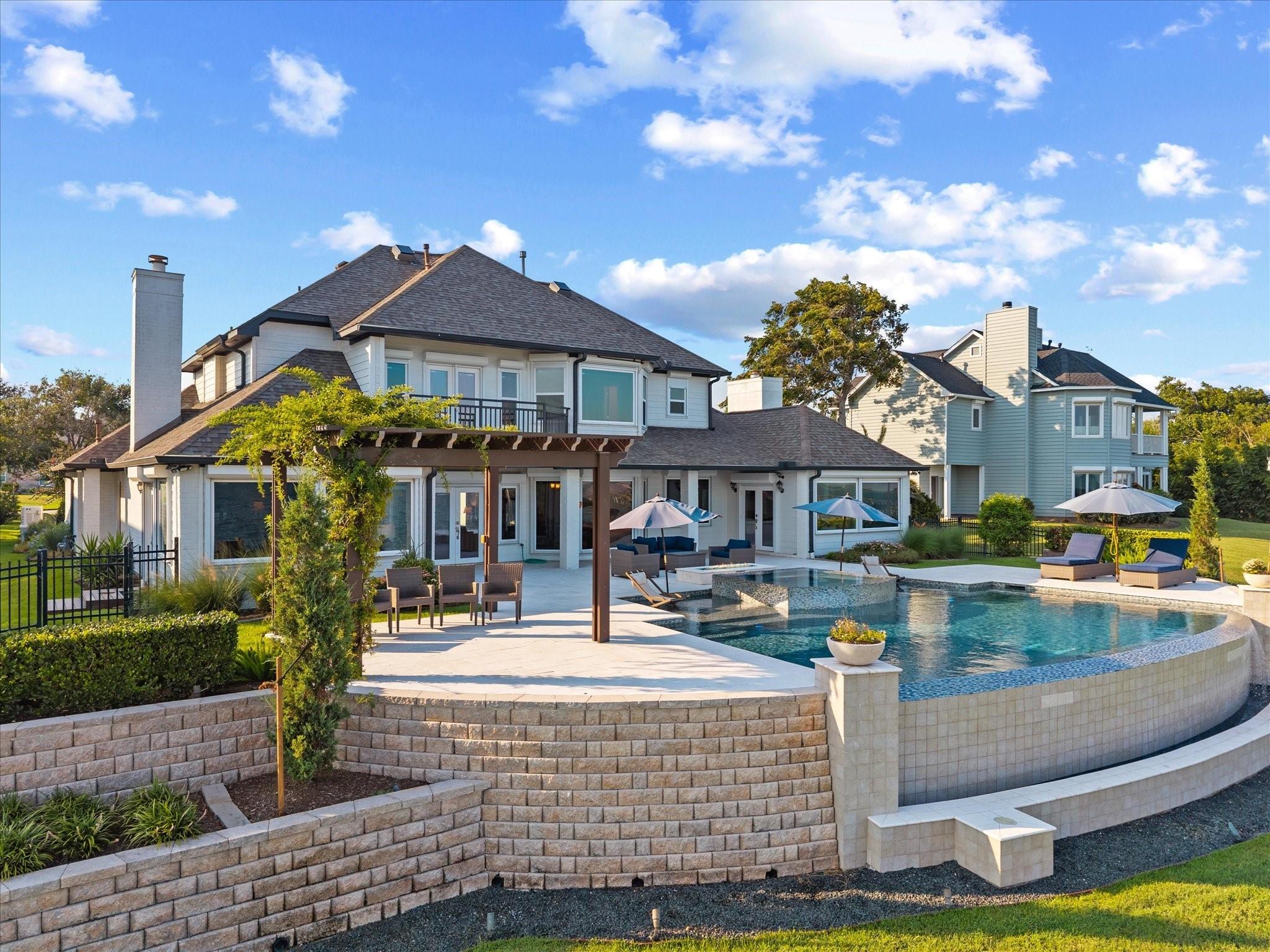 Image 4: DAYLIGHT AERIAL VIEW OF THE OUTDOOR ENTERTAINING A