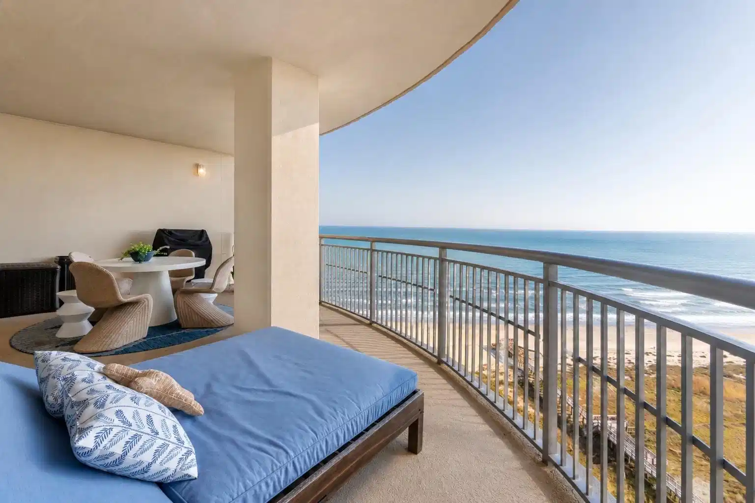 Image 1: Expansive private balcony with comfortable outdoor