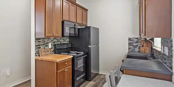 Image 2: This kitchen features modern appliances, including