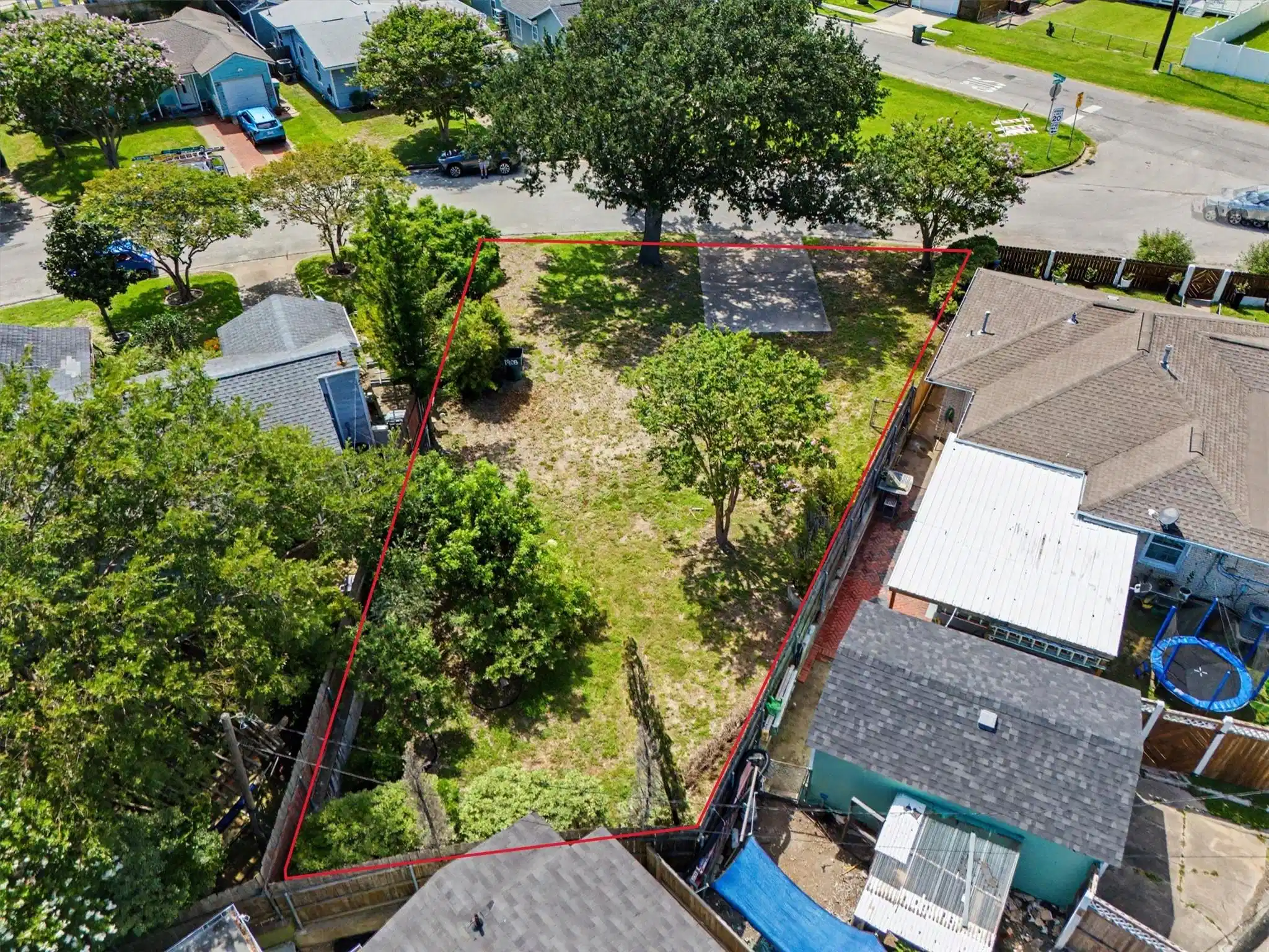 Image 1: Great Mature Trees line this lot