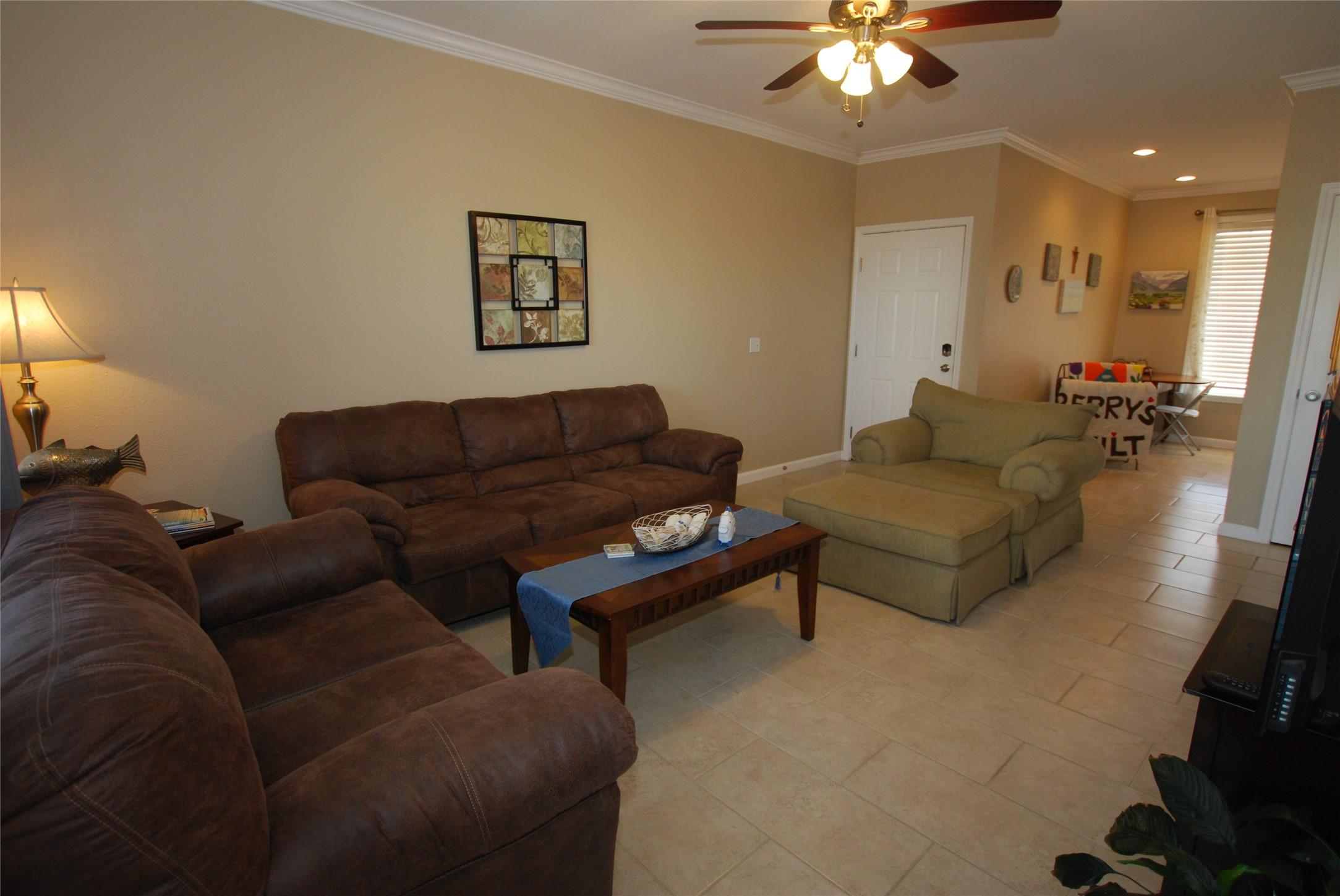 Image 4: Tile floors throughout living space are easier to