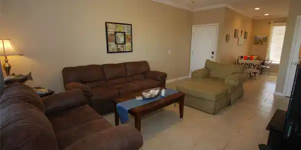 Image 4: Tile floors throughout living space are easier to