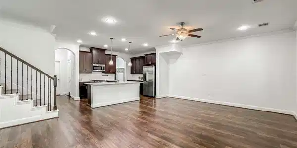 Image 4: This spacious open-concept room features luxury vi