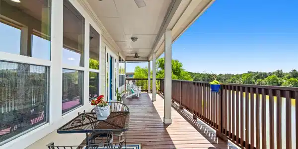 Image 4: Spacious covered deck, perfect for that morning up