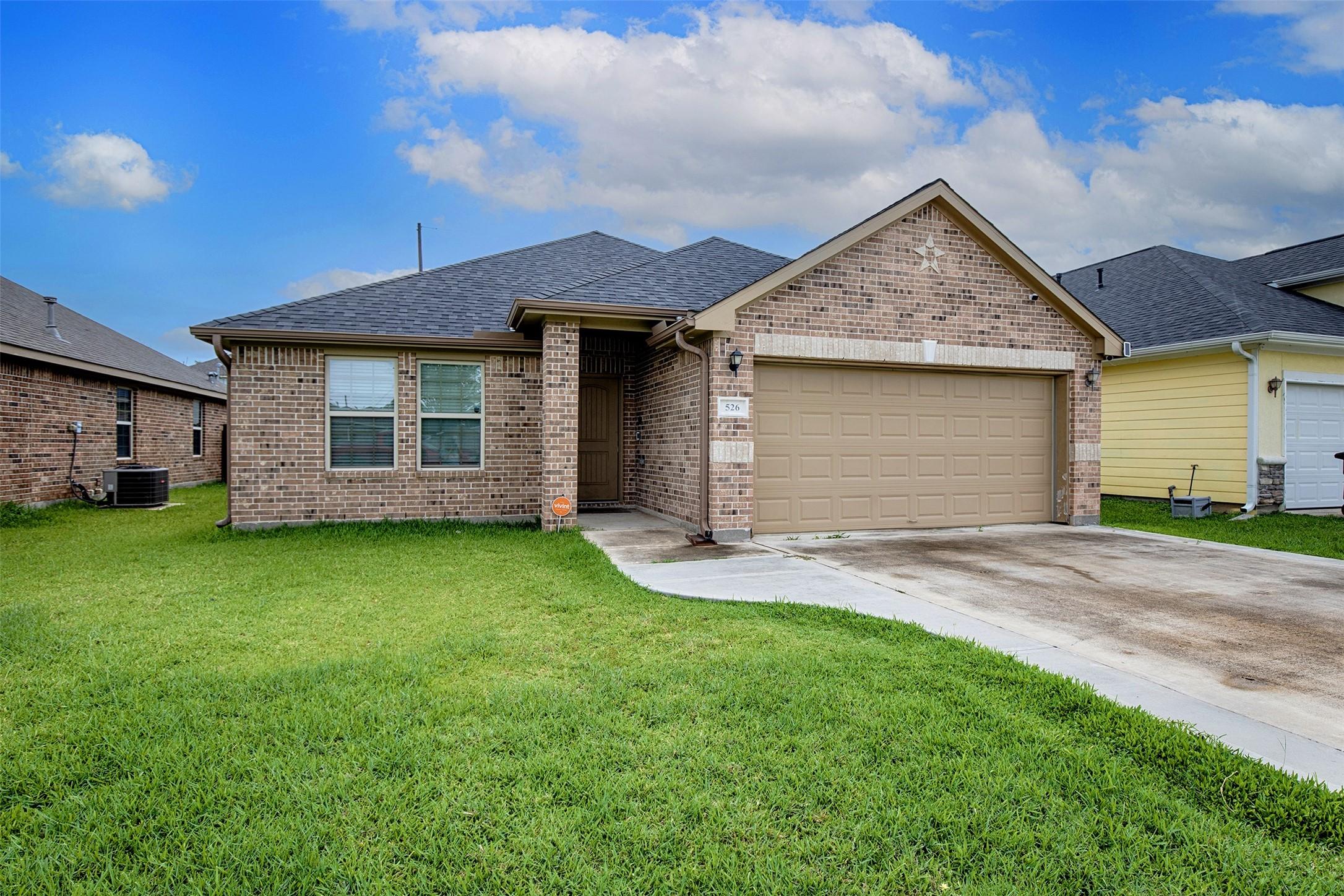 Image 2: Charming curb appeal with covered entry.