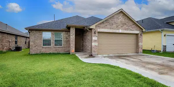 Image 2: Charming curb appeal with covered entry.