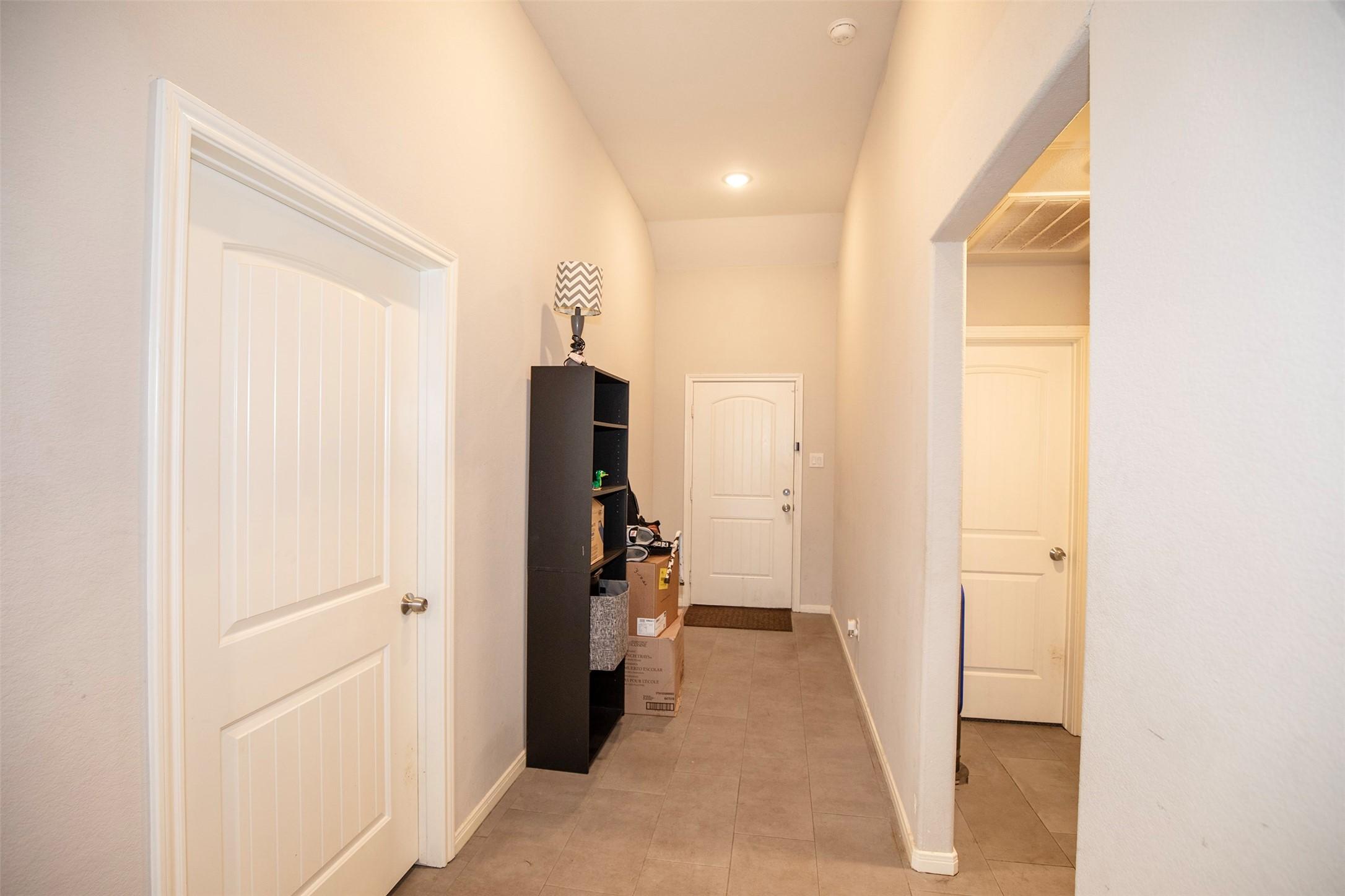 Image 4: foyer leading into the main living areas.