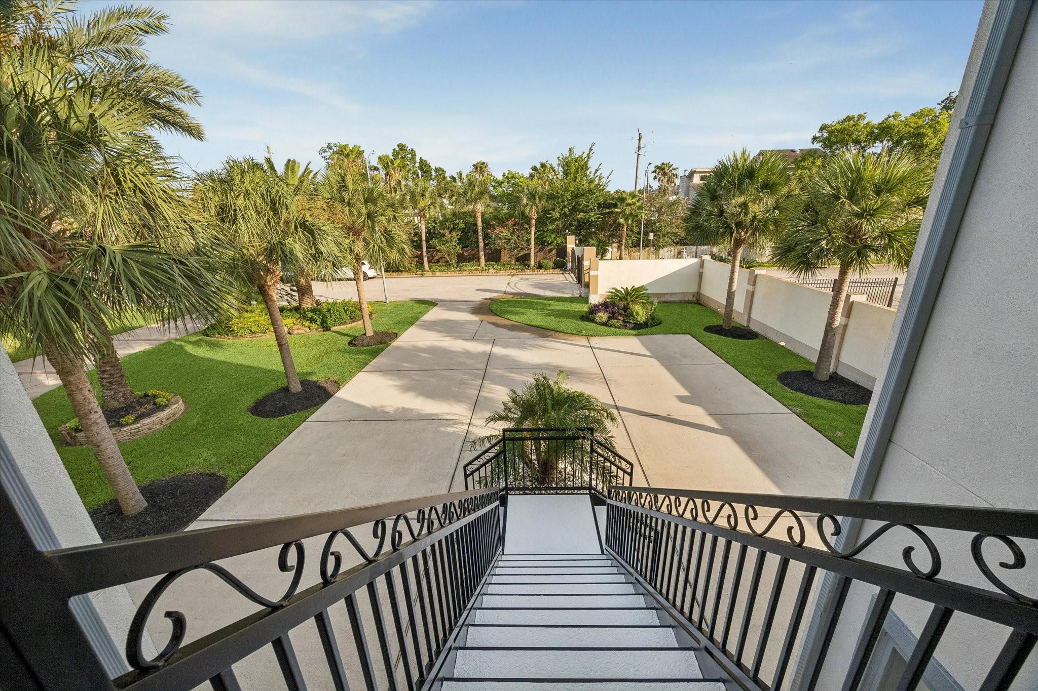 Image 4: Elegant wrought-iron railings, the elevated approa
