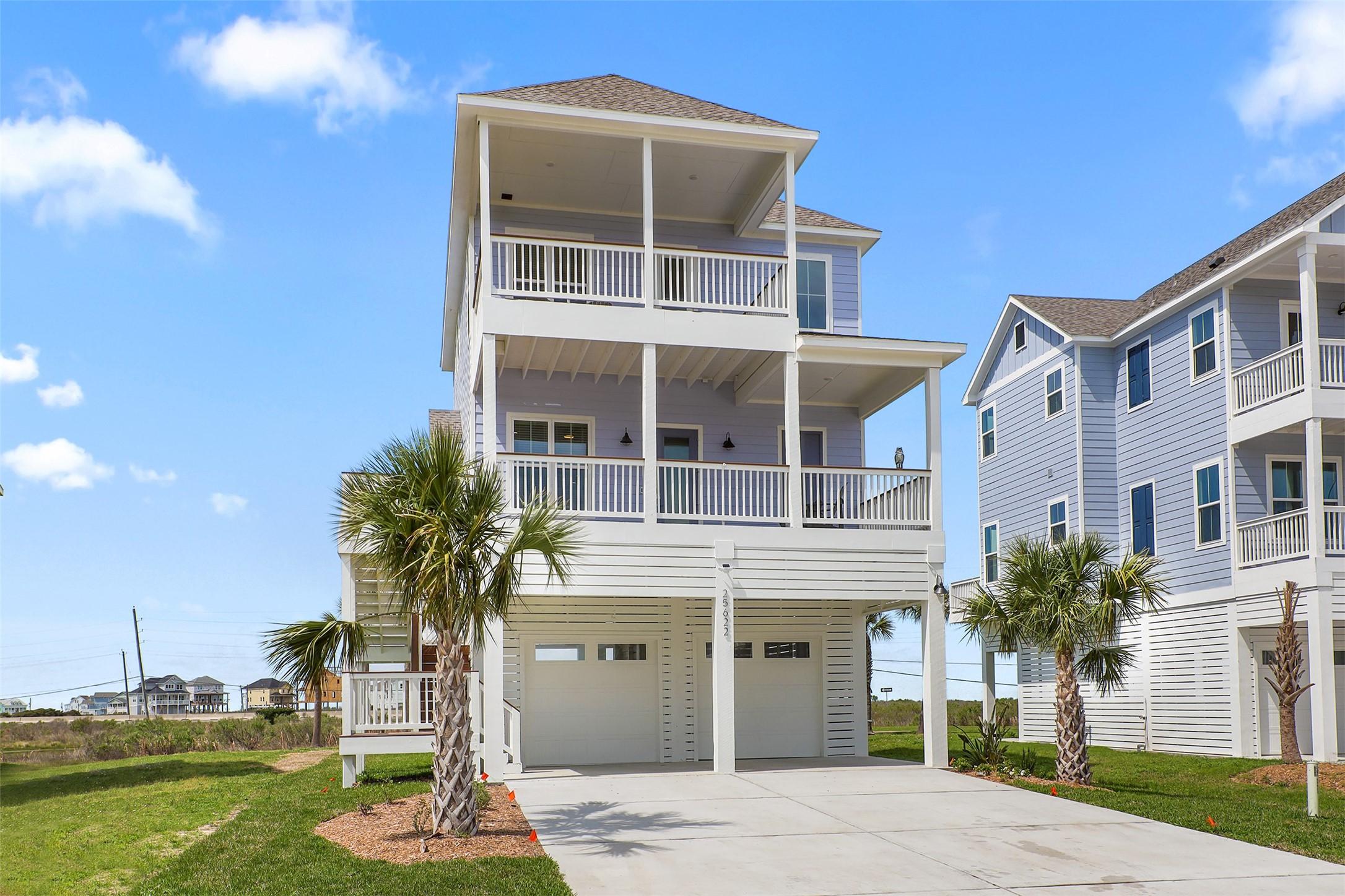 Image 2: This view highlights the home&rsquo;s striking beachside