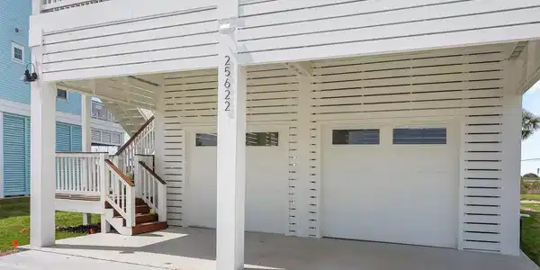 Image 4: The spacious ground-level patio provides plenty of