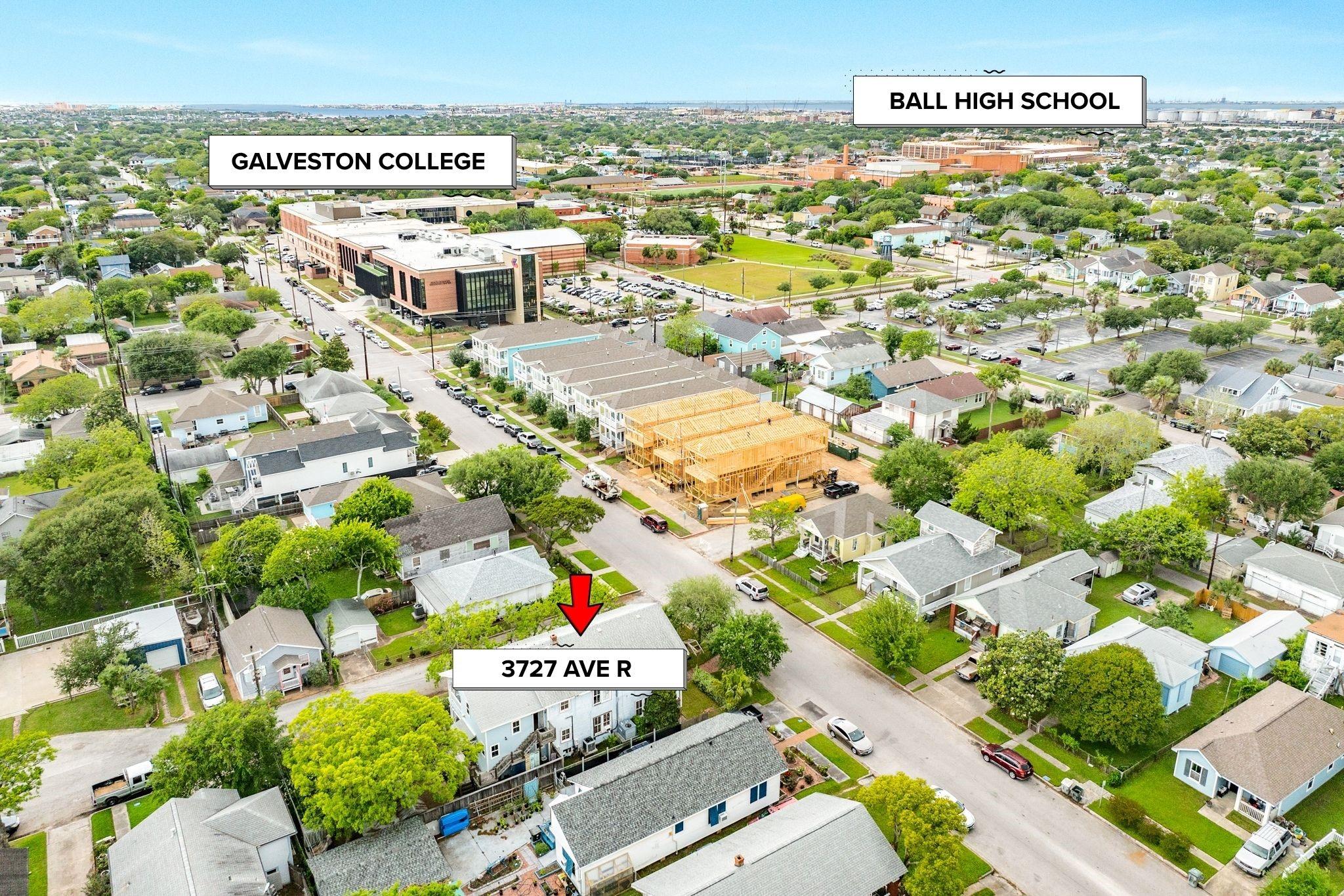 Image 2: The duplex is located one block from Galveston Col