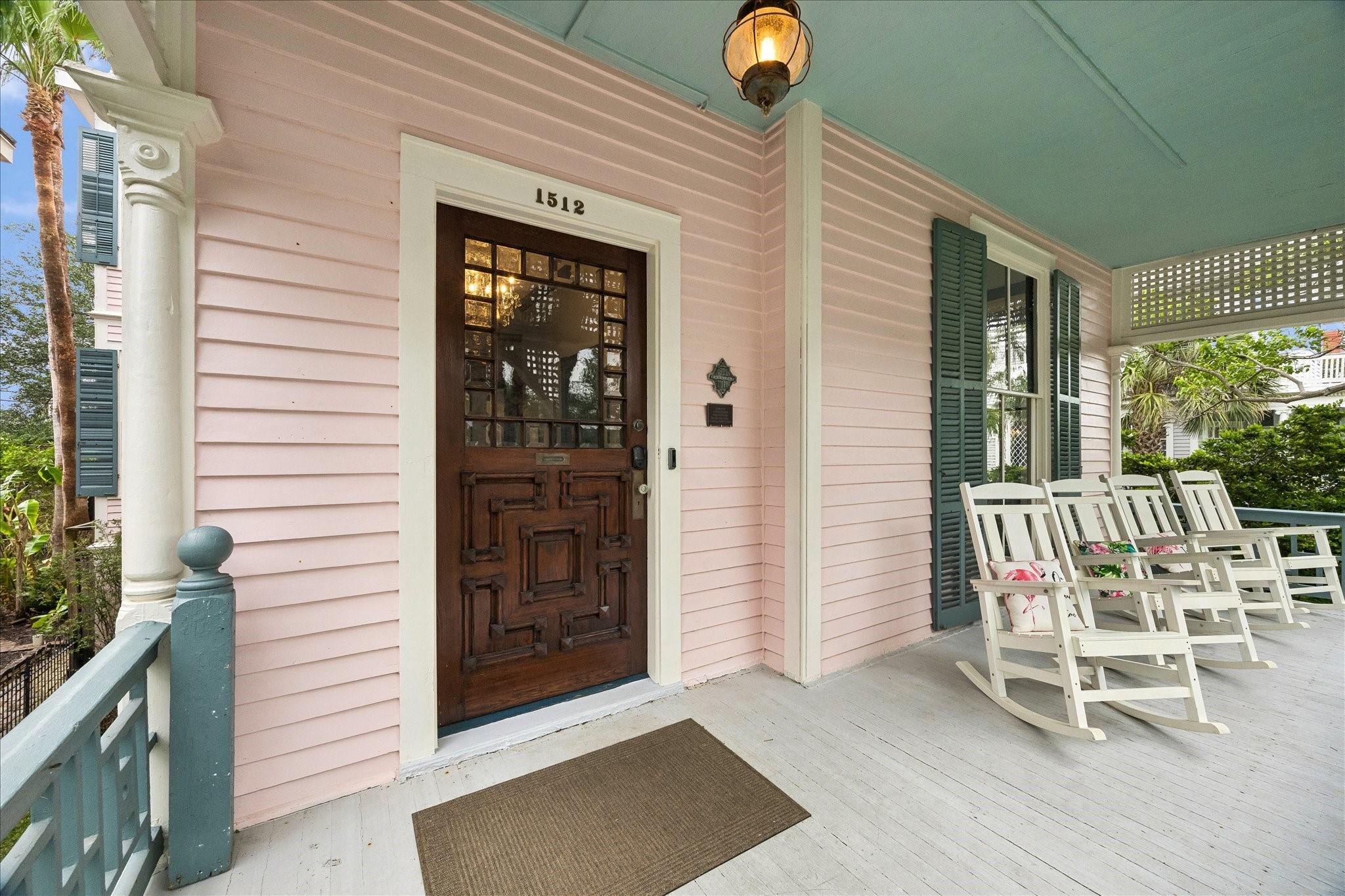 Image 2: Charming front porch was recently restored includi