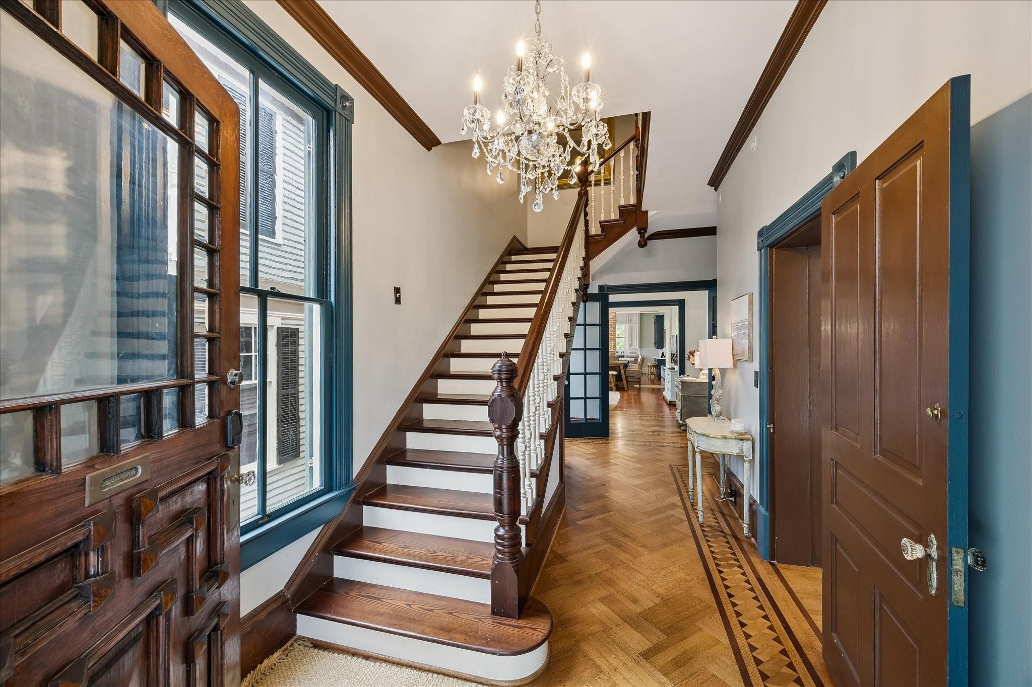 Image 3: ENTRY - Grand entryway with recently refinished ma