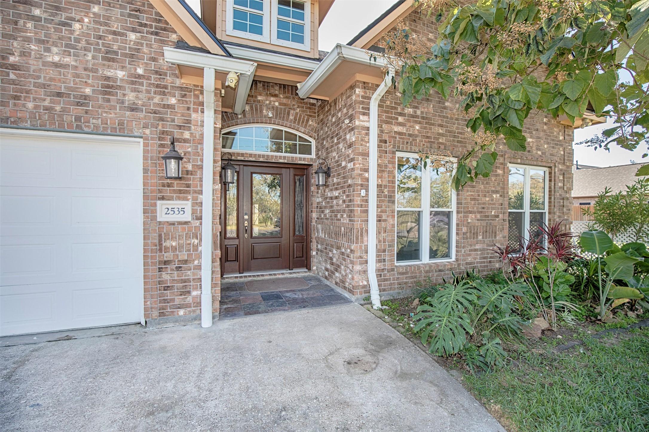 Image 3: The front porch features slate tile.