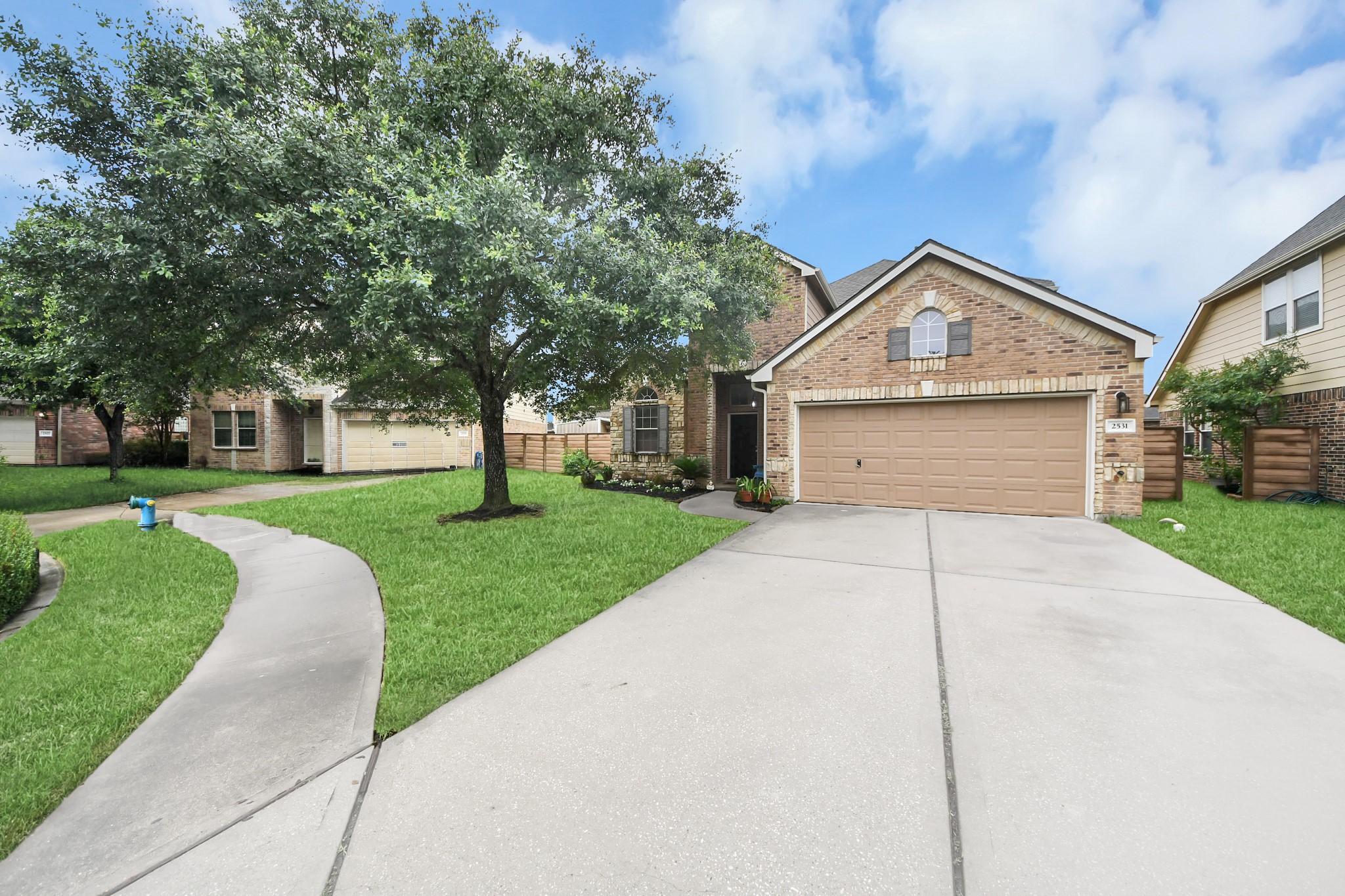 Image 2: Oversized driveway!