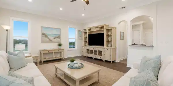 Image 4: Family room opens up to the dining area, and the b