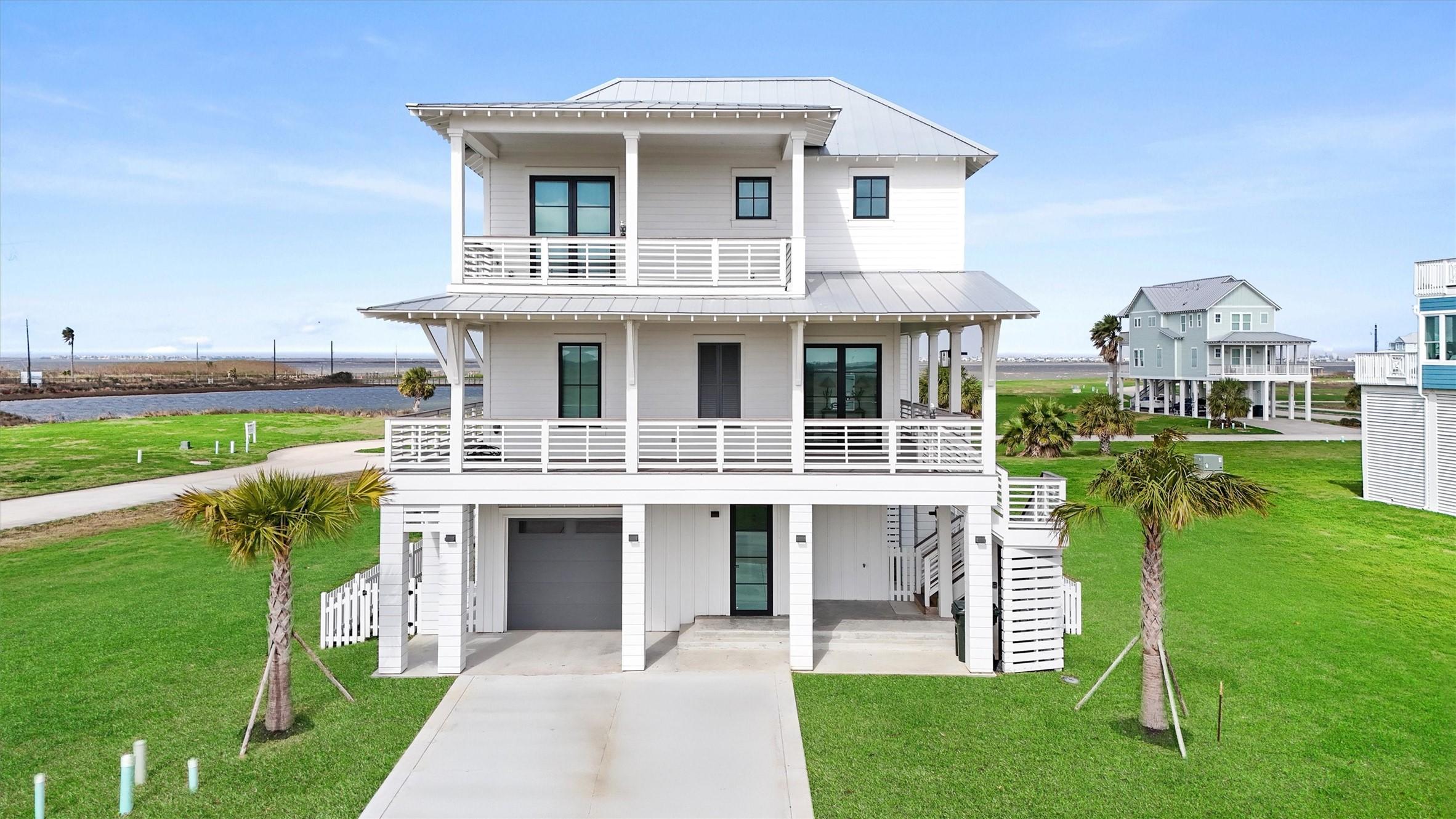 Image 1: Welcome to Sweetwater Cove with this elevated coas