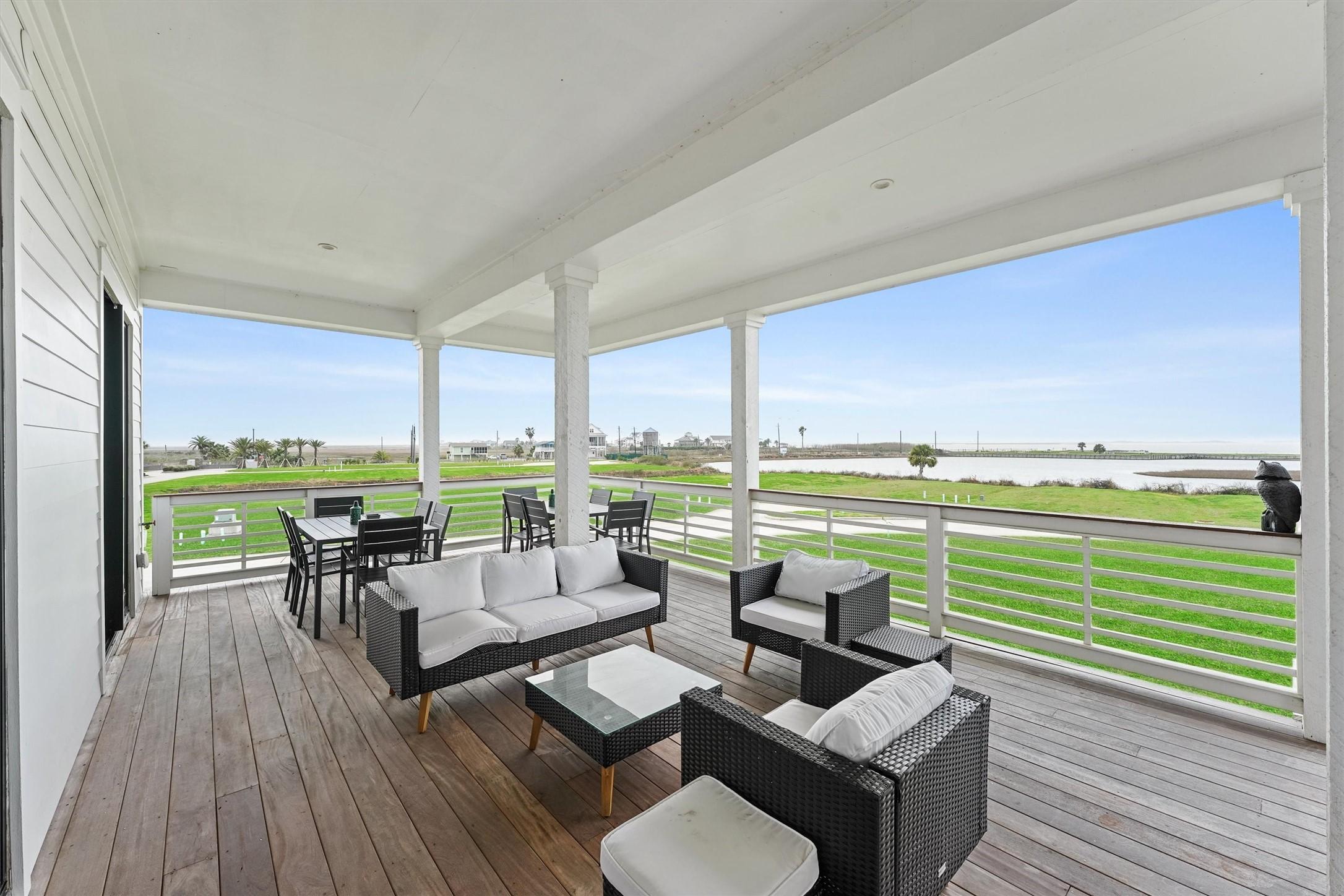 Image 2: Expansive upper deck with panoramic bay views, per