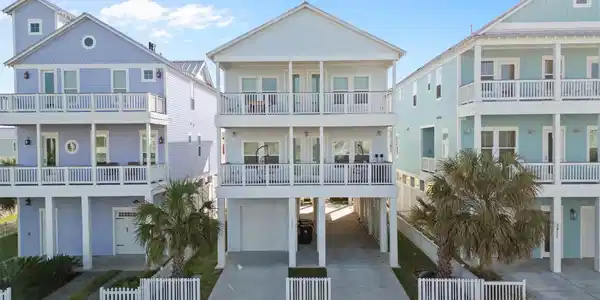 Image 3: A straight on aerial view captures the home's clea