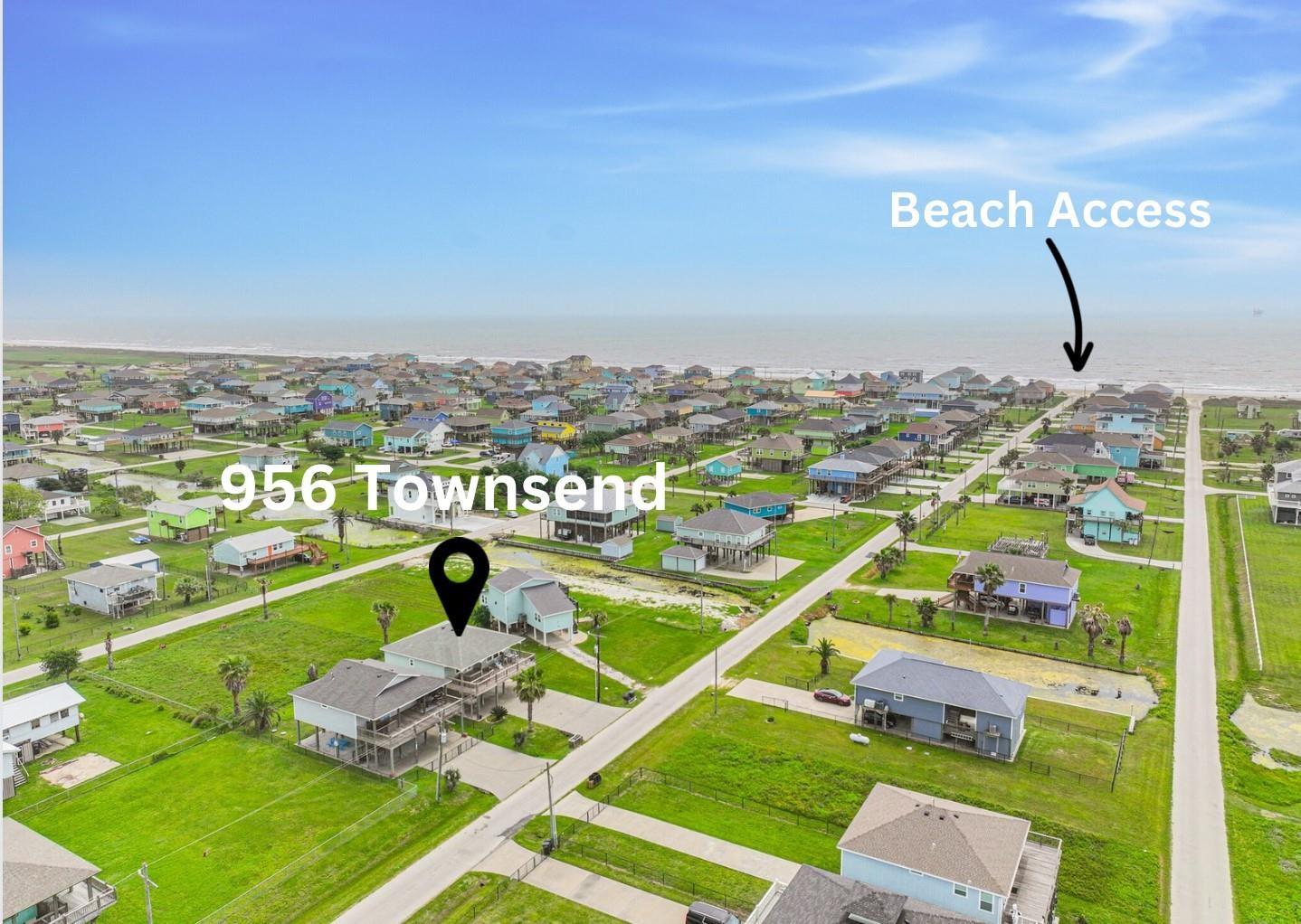 Image 3: This aerial photo showcases a coastal neighborhood