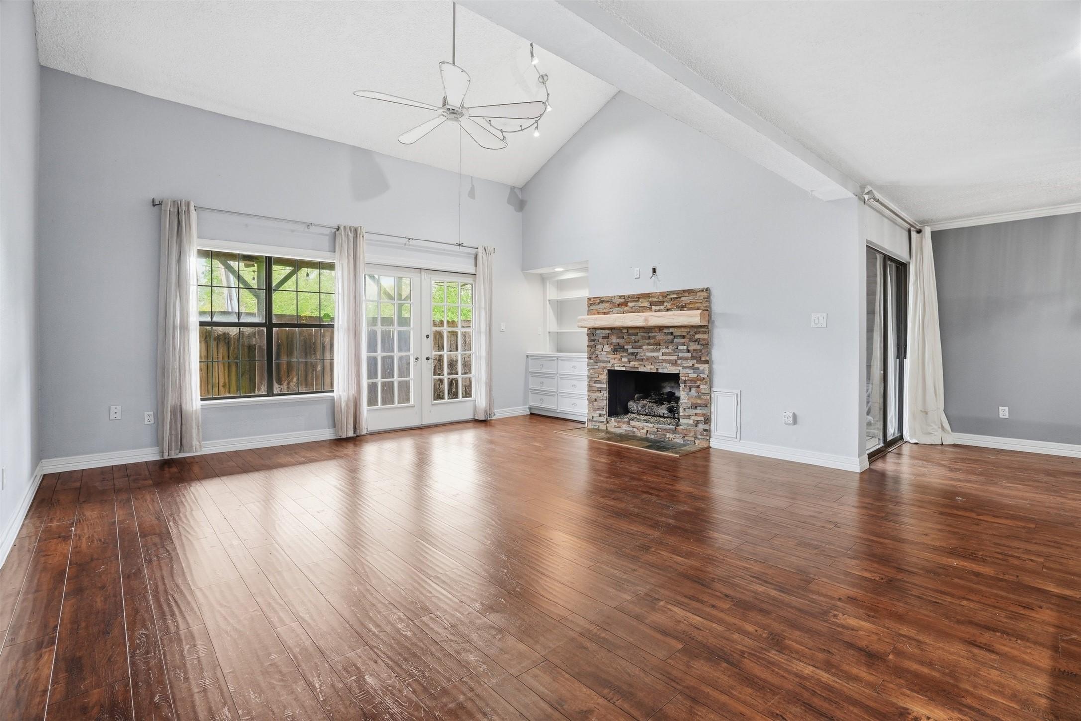 Image 4: Inviting living room centered around a beautiful s
