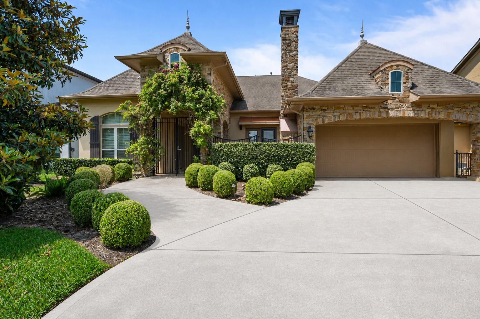 Image 1: Front of home. Double wide driveway and plenty of