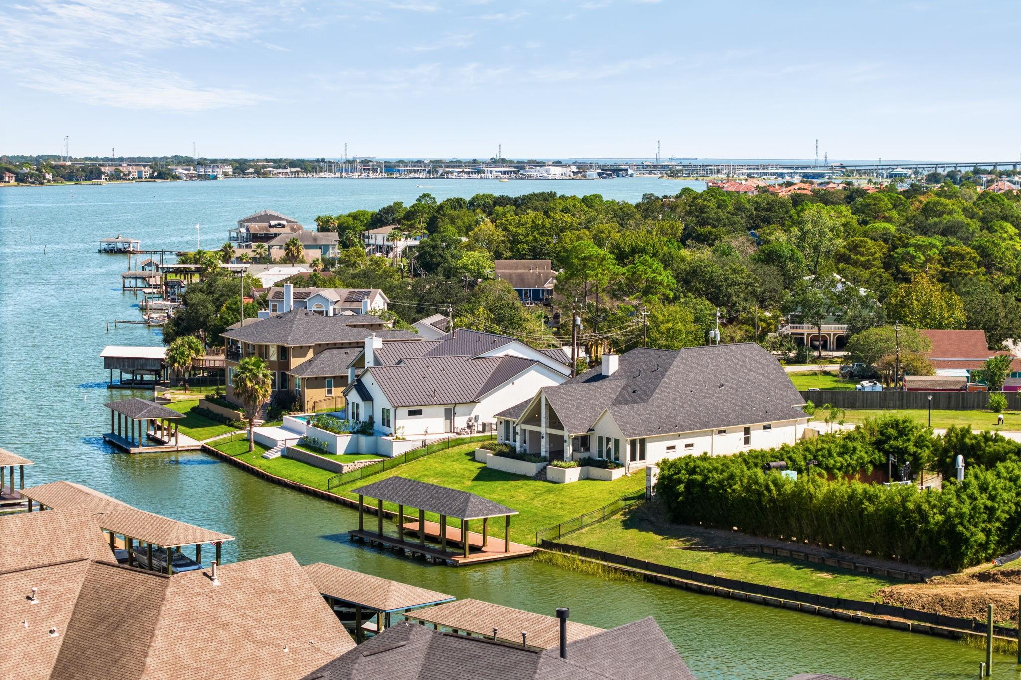 Image 1: Aerial view highlighting the home&rsquo;s position withi