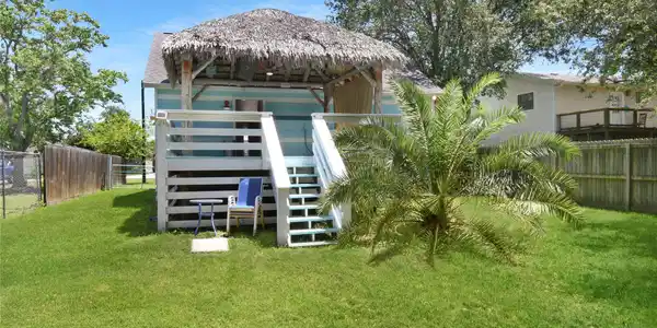 Image 4: Discover your private oasis with a lush green yard