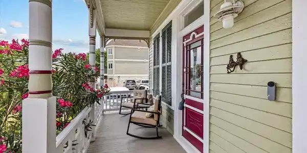 Image 4: Front porch living is a classic feature of the his