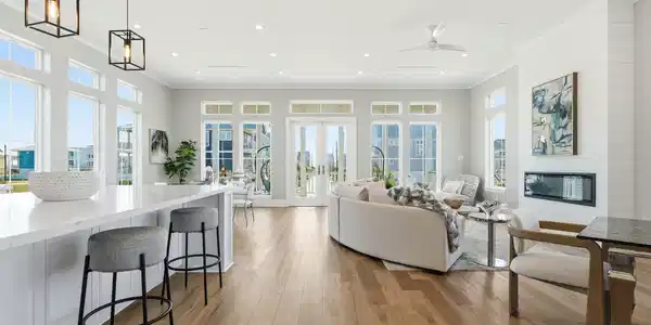 Image 3: This photo showcases a bright, open-concept living