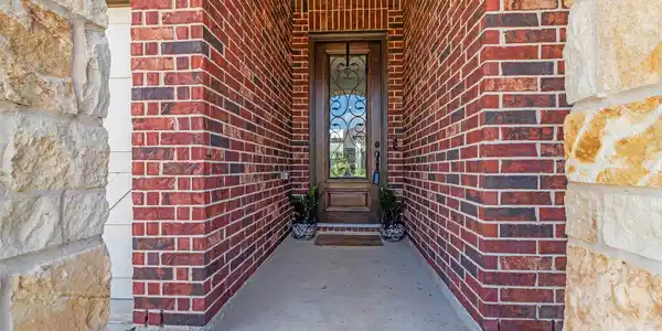 Image 4: Great glass leaded door welcomes you and your gues