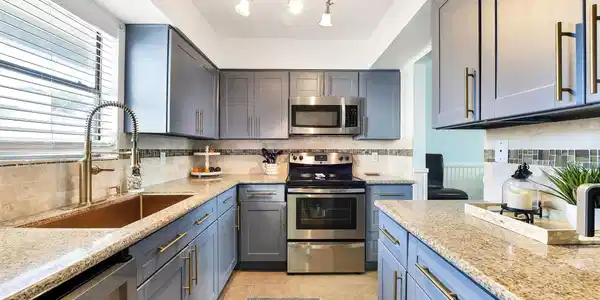 Image 4: Updated kitchen with painted cabinetry, new sink a