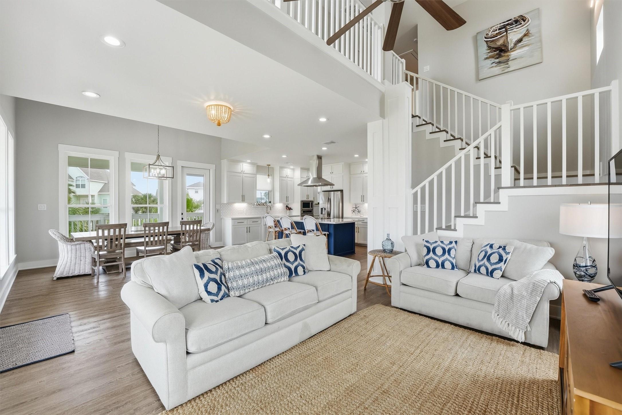 Image 4: Open-concept living and dining area with bright in