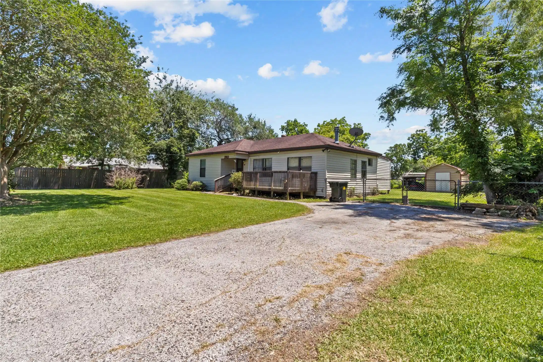 Image 1: This photo showcases a charming single-story home