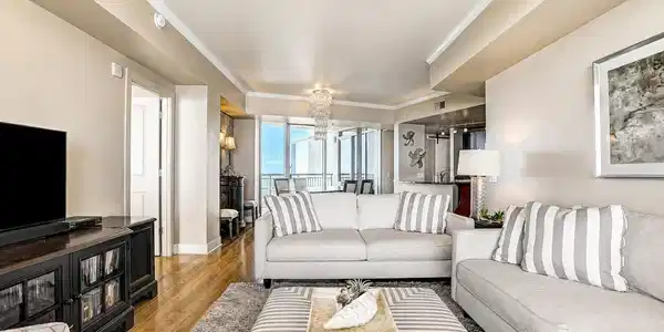 Image 4: Spacious open living area connecting the kitchen,