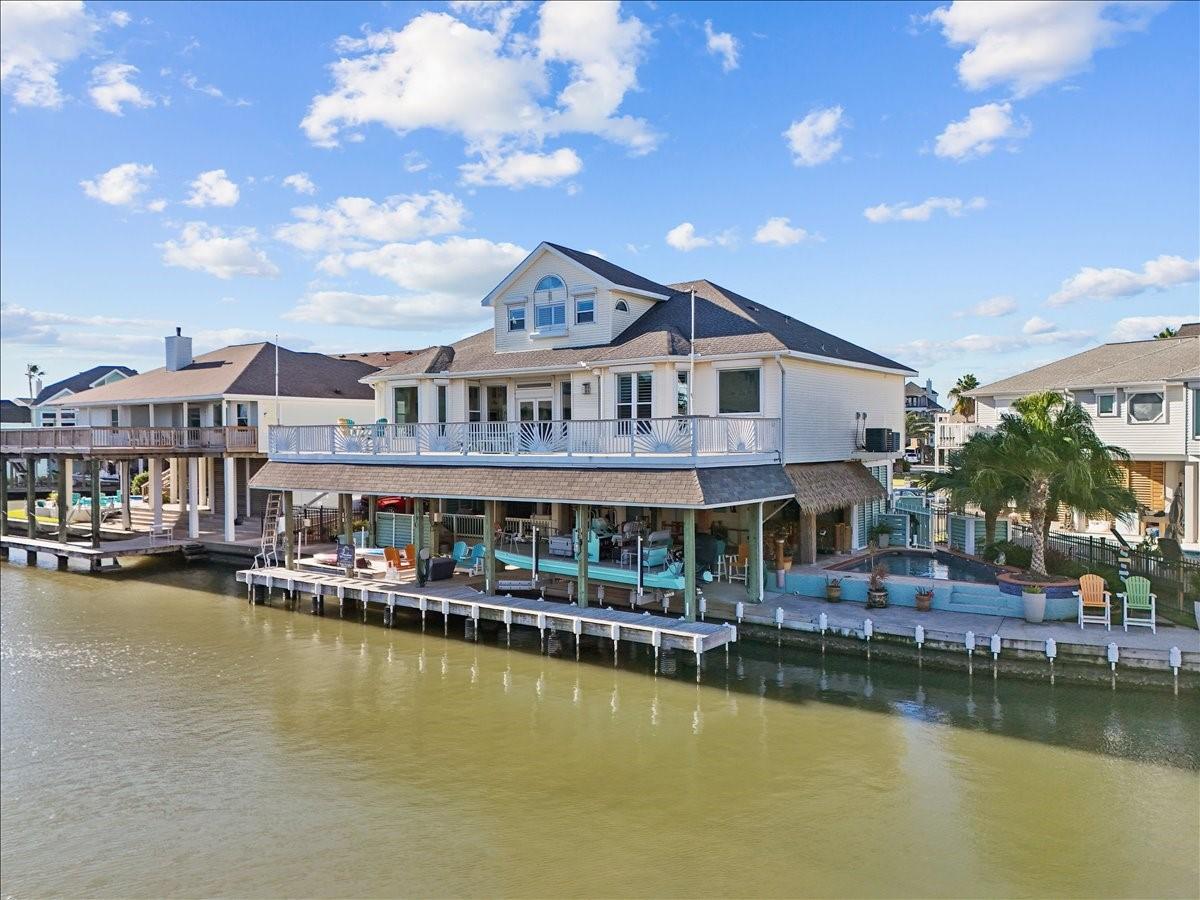 Image 4: The expansive outdoor space at this home offers a