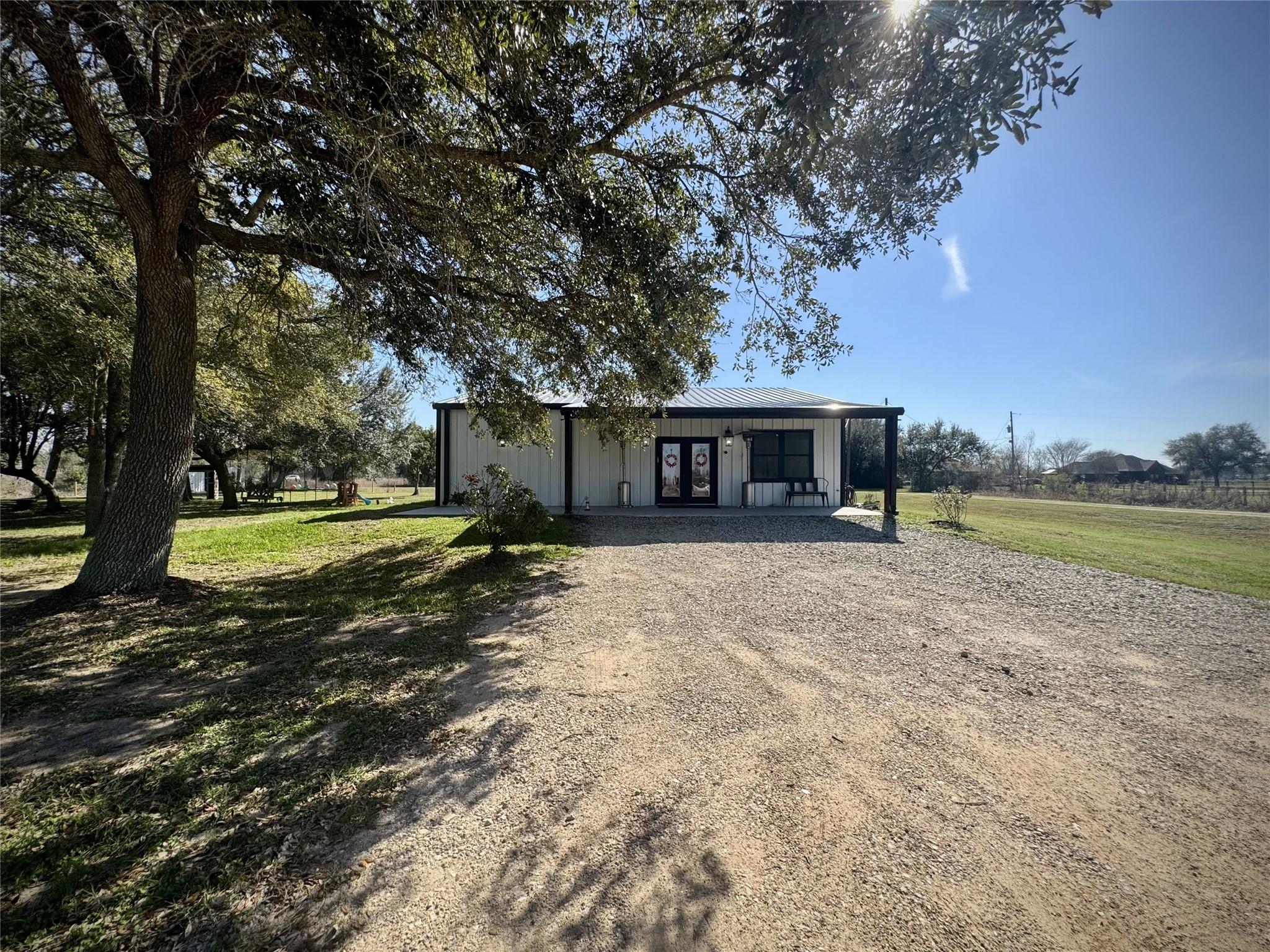 Image 4: Driveway up to home provides ample parking
