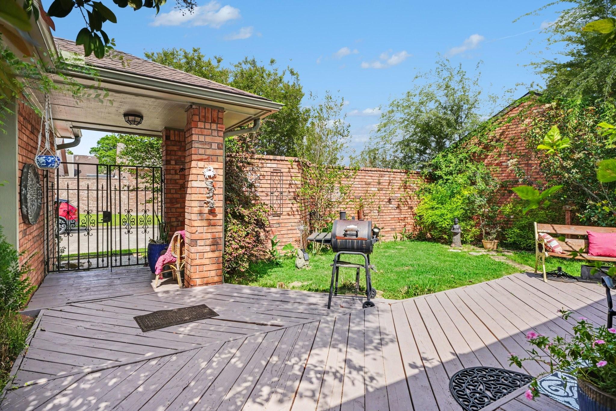 Image 4: Expansive multi-level patio with fresh paint and g