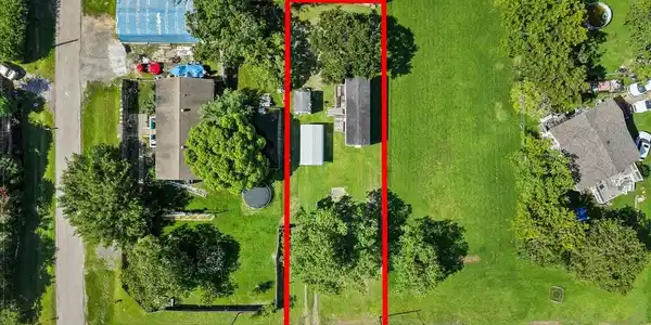 Image 2: Overhead aerial view outlines the rectangular lot