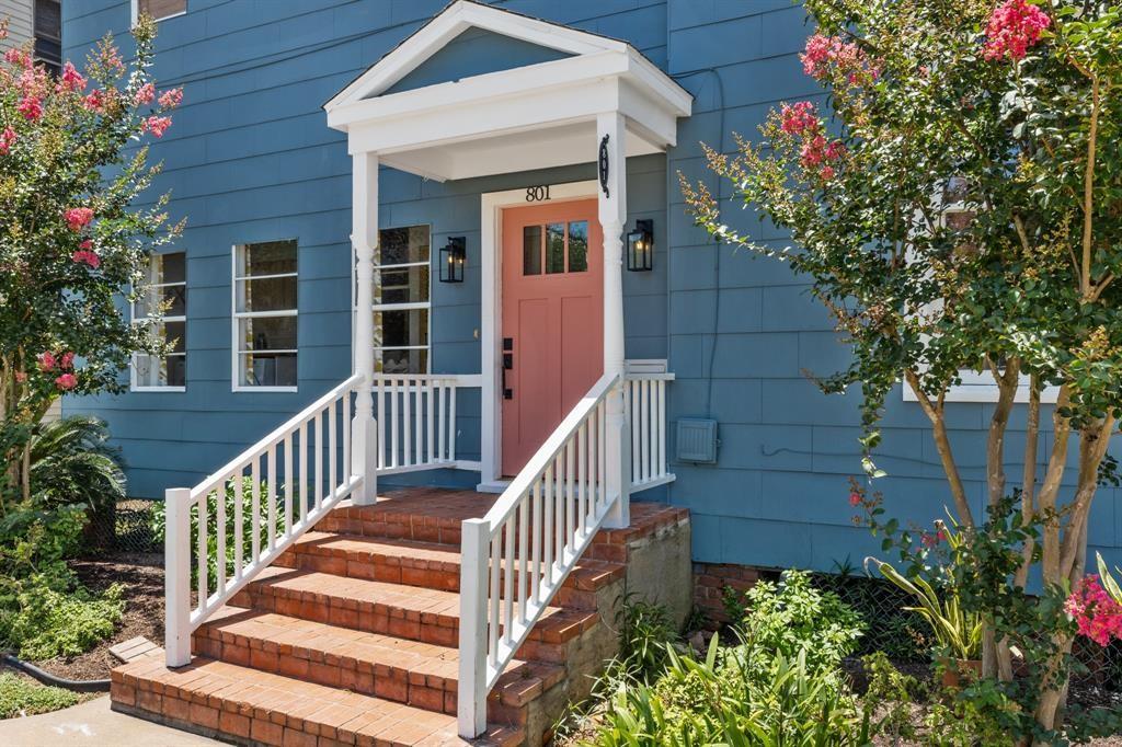 Image 3: Covered front stoop leading to the entry.