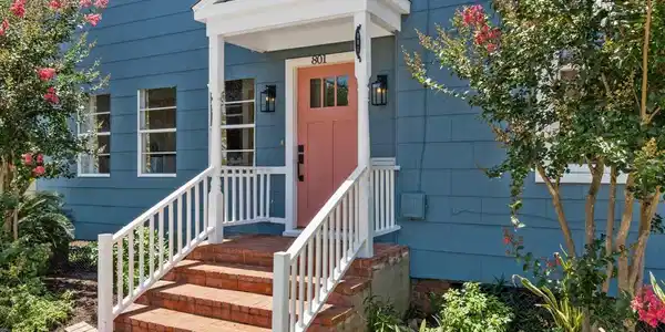 Image 3: Covered front stoop leading to the entry.
