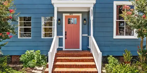 Image 4: Covered front stoop leading to the entry.