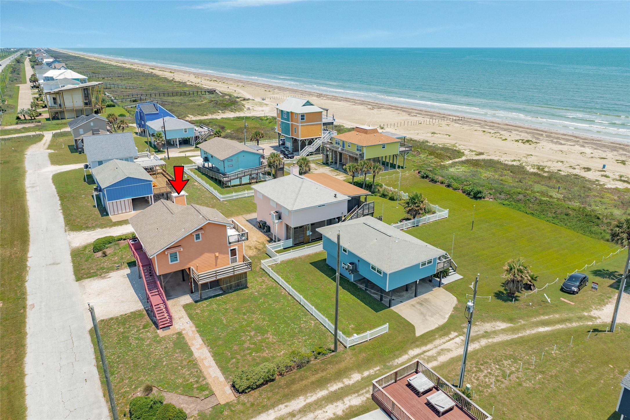 Image 2: Facing East with side vie of home.