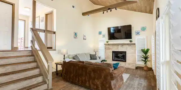 Image 3: Spacious family/living area with fireplace.  Beaut