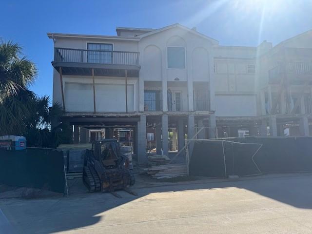 Image 1: Front view of the home currently being professiona