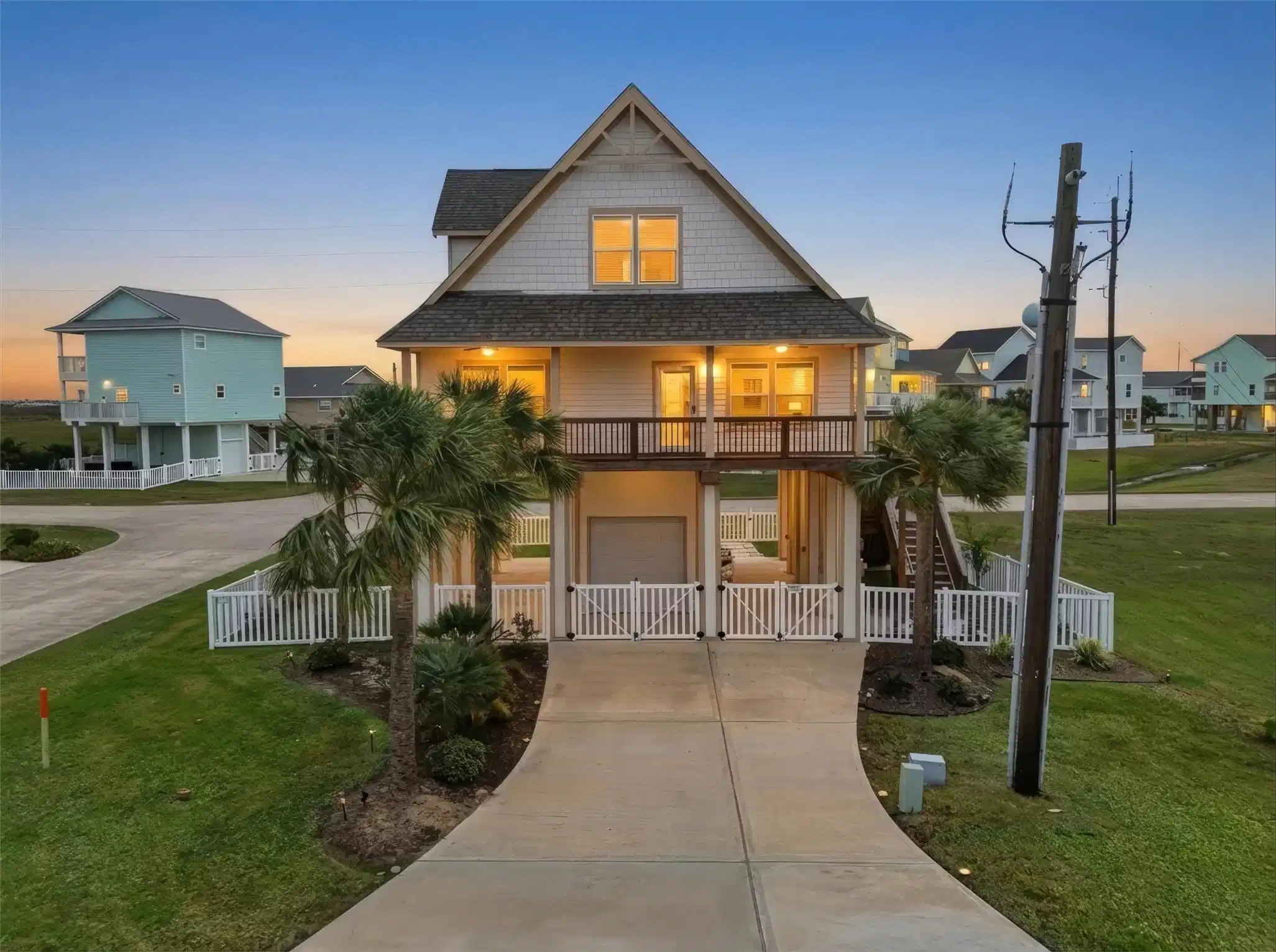 Image 1: Elevated coastal home on a corner lot with bay vie
