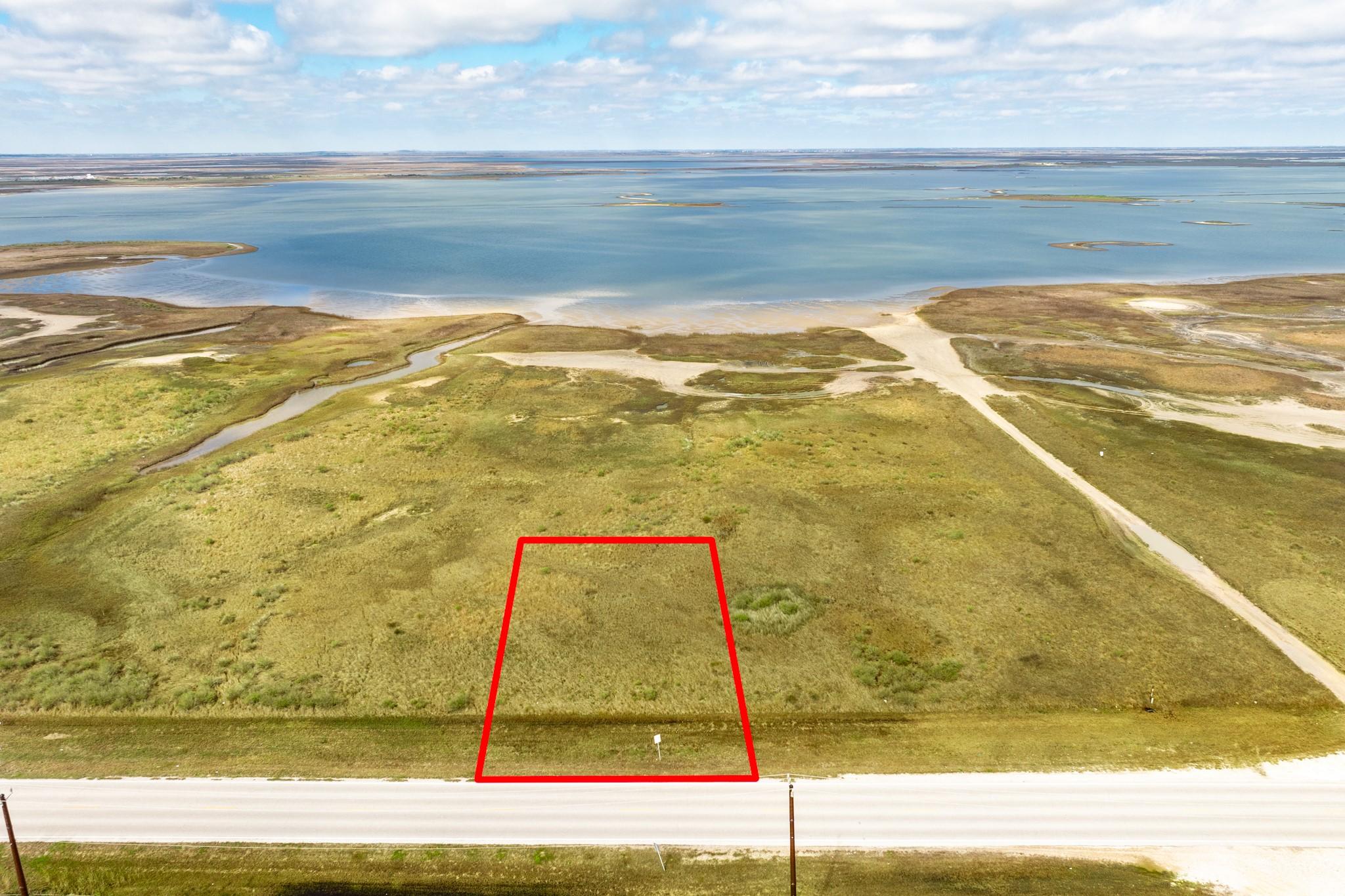 Image 3: Expansive Gulf and bay views surround this ideally